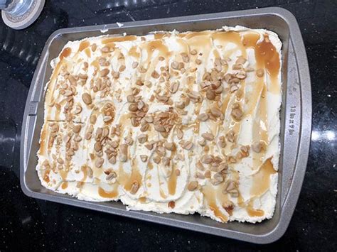 vanilla-poke-cake-with-salted-caramel-and-buttercream image