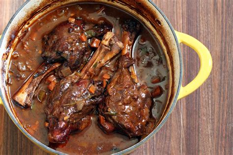 savory-oven-braised-lamb-shanks-recipe-the-spruce image