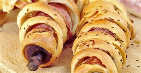 campfire-bacon-wrapped-breadsticks-recipe-eat image