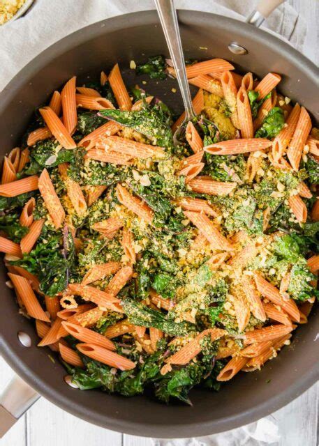 red-lentil-pasta-with-garlicky-lemon-greens-and-walnuts image