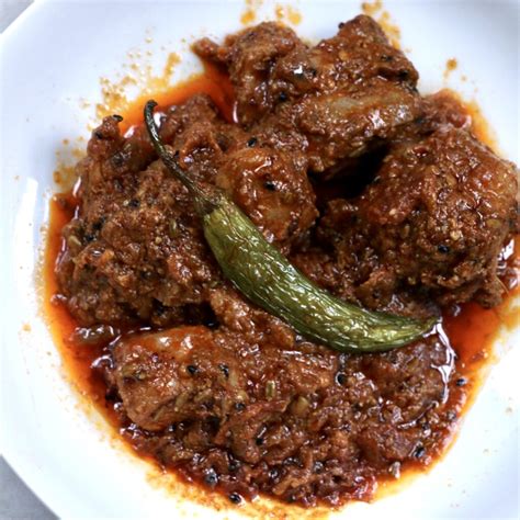 achari-chicken-pakistani-chicken-curry-with-pickling image