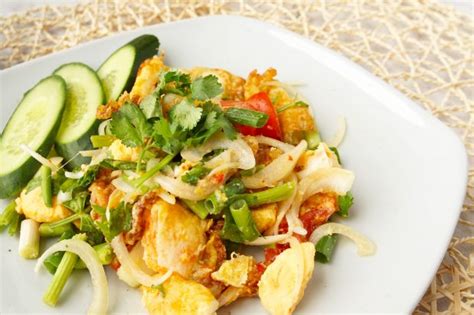 spicy-salad-with-fried-egg-yum-khai-dao-asian image