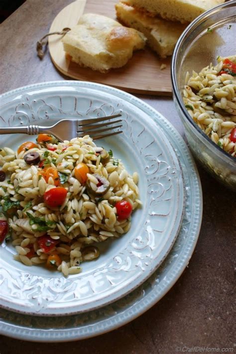 lemon-orzo-pasta-salad-with-olives-and-tomatoes image
