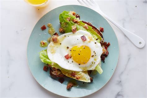 bacon-and-egg-breakfast-caesar-salad-food-network image