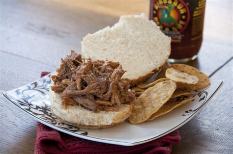 crock-pot-root-beer-pulled-pork-wishes-and-dishes image