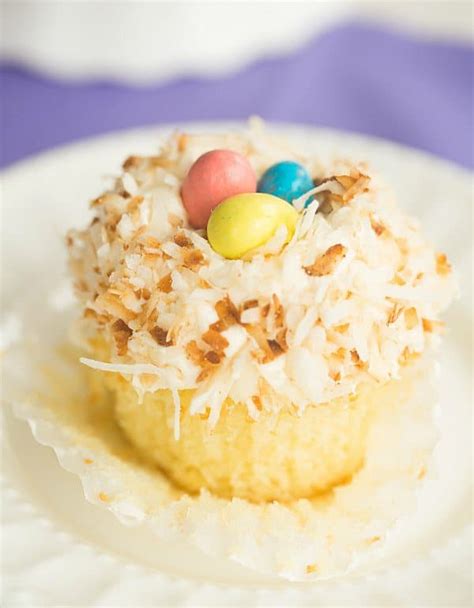 coconut-cupcakes-with-toasted-coconut-frosting image