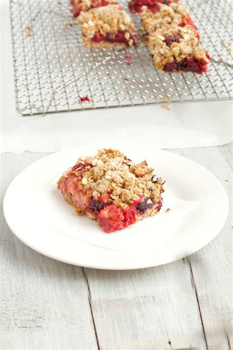 mixed-berry-oatmeal-bars-sinful-nutrition image
