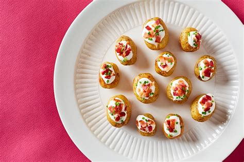 mini-baked-potatoes-with-sour-cream-and-bacon image