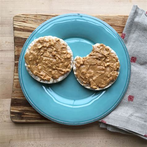 rice-cakes-with-peanut-butter-eatingwell image