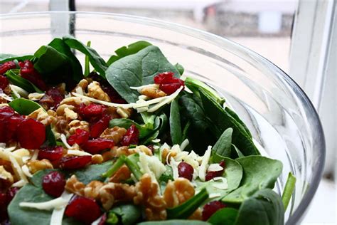 mixed-greens-with-walnuts-and-dried-cranberries image