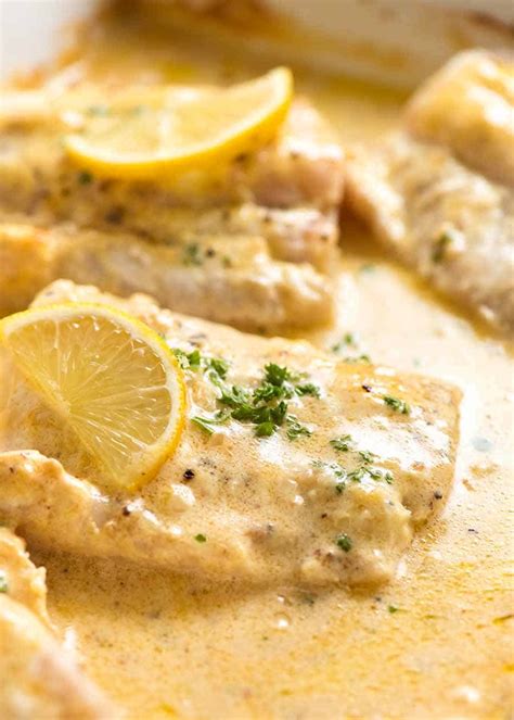 baked-fish-with-lemon-cream-sauce-recipetin-eats image