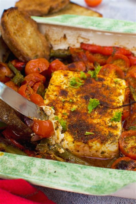 our-favorite-baked-feta-with-tomatoes-peppers-and-olives image