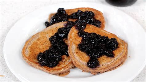 sunday-morning-pancakes-with-blueberry-honey-sauce image