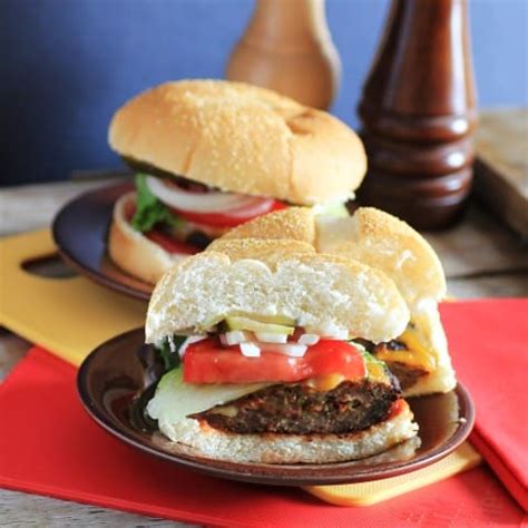 bacon-pickle-and-cheese-stuffed-burgers-noshing image