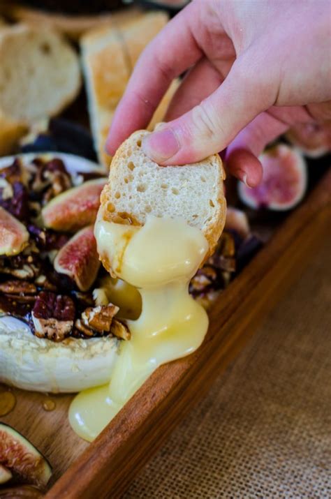baked-brie-with-fig-jam-and-nuts-food-above-gold image
