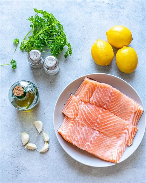easy-baked-lemon-garlic-salmon-healthy-fitness-meals image