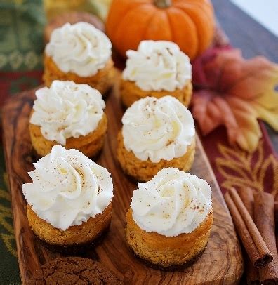 mini-pumpkin-cheesecakes-with-gingersnap-crusts image