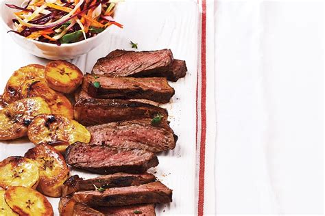 caribbean-steak-with-grilled-plantains-and-coleslaw image