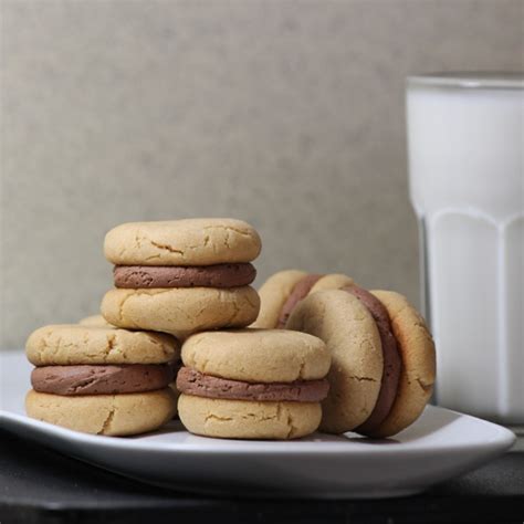 peanut-butter-cookies-with-whipped-ganache-filling image