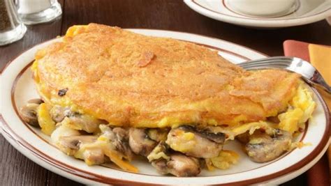 chicken-omelette-with-sauteed-mushrooms image