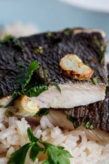 oven-grilled-fish-with-lemon-pilaf-simply-delicious image