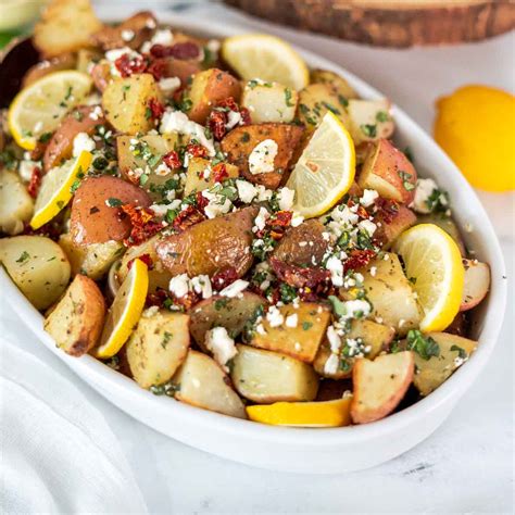 lemony-greek-roasted-potatoes-with-feta-and-fresh-herbs image