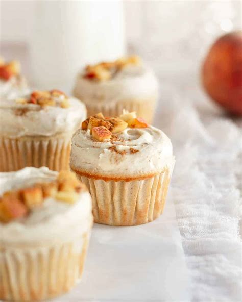 fresh-peach-cupcakes-brown-butter-frosting-bake image