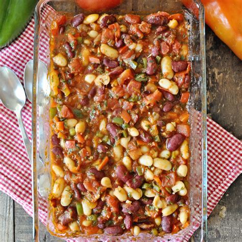spanish-baked-beans-with-tomatoes-and-peppers image