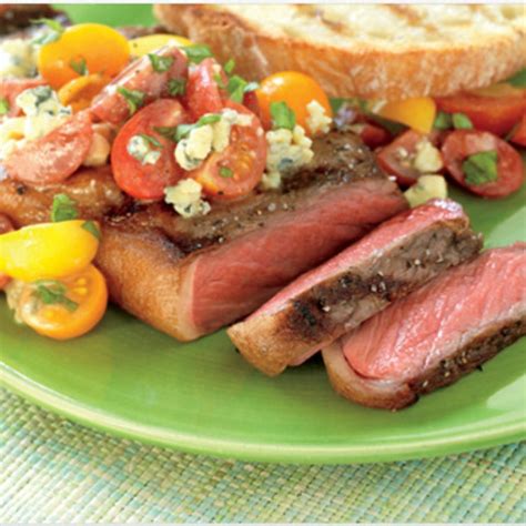 strip-steaks-with-tomato-and-blue-cheese-vinaigrette image