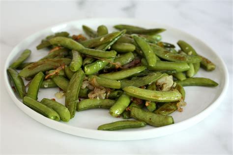 roasted-sugar-snap-peas-with-shallots-classic image