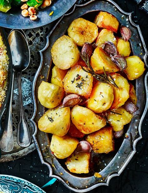 garlic-and-herb-roast-potatoes-sainsburys-magazine image