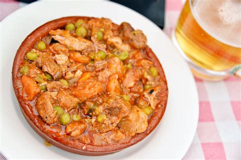 crock-pot-spanish-style-pork-stew-recipe-the-spruce image