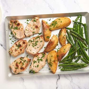 sheet-pan-pork-chops-with-potatoes-and-green-beans image