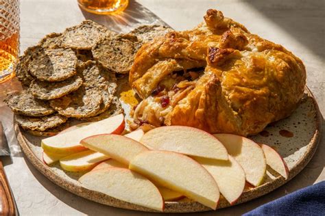 baked-brie-with-spiced-pears-and-cherries-food-wine image