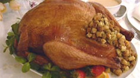 stuffed-roast-turkey-and-gravy-recipe-pillsburycom image
