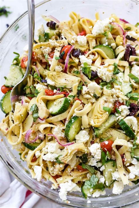 greek-pasta-salad-with-cucumbers-and-artichoke image