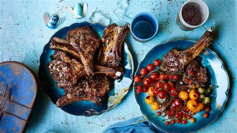 lamb-chops-scottadito-with-charred-cherry-tomatoes image