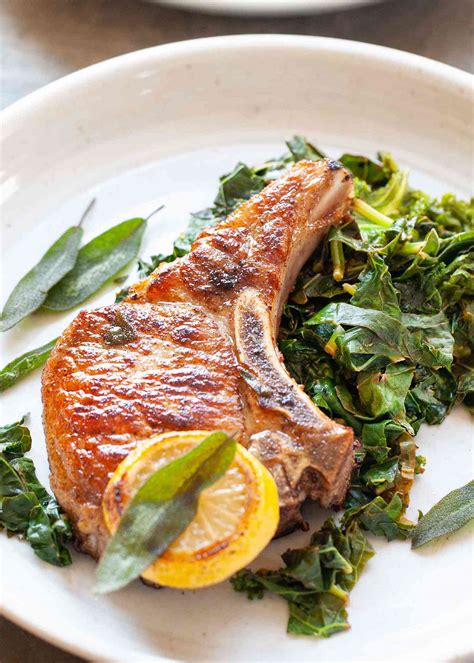 pan-seared-pork-chops-with-garlic-and-greens image