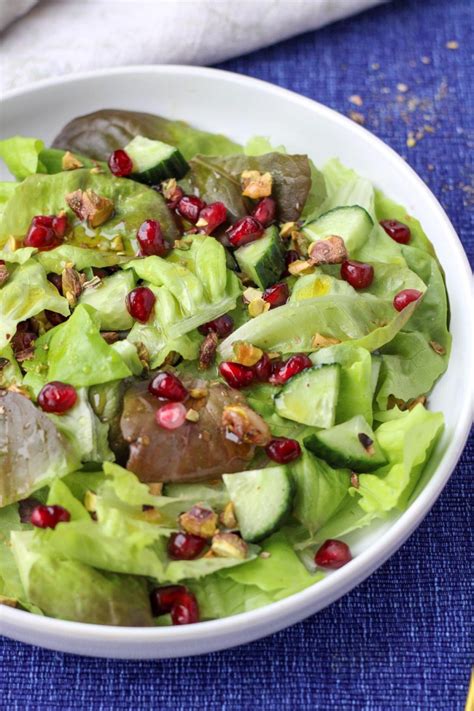 easy-butter-lettuce-salad-with-pomegranates-and-pistachios image
