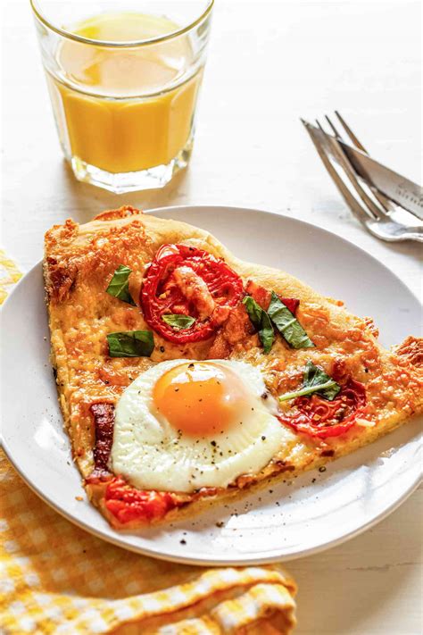 breakfast-pizza-with-cheddar-bacon-and-eggs image