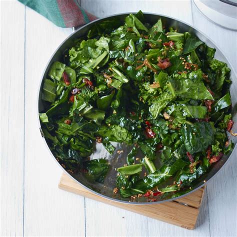 sauted-spring-greens-with-bacon-and-mustard-seeds image