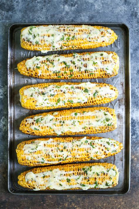 roasted-corn-with-garlic-herb-buttery-spread-damn image