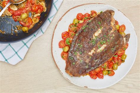 pan-fried-lemon-sole-with-tomato-and-caper-sauce image