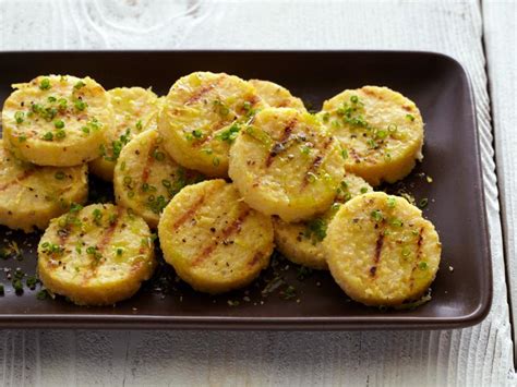 grilled-chickpea-polenta-cakes-with-chive-oil-and-lemon image