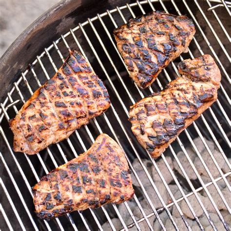 spicy-orange-ginger-grilled-pork-tenderloin-steaks image