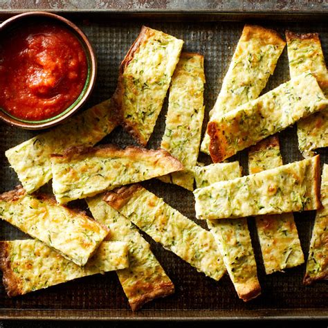 cheesy-zucchini-breadsticks-recipe-eatingwell image