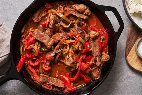 skillet-pepper-steak-and-rice-recipe-the-spruce-eats image