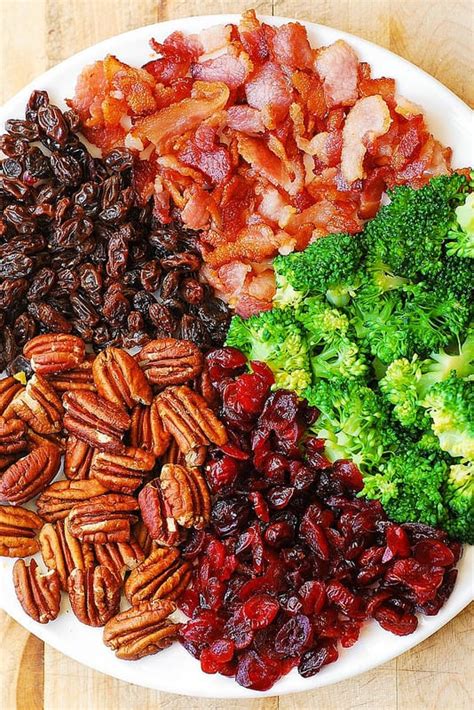 broccoli-bacon-salad-with-pecans-raisins-and-cranberries image