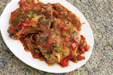 shoulder-pork-chops-with-tomatoes-and-peppers image