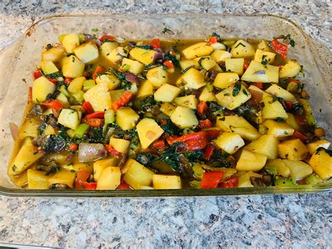 potatoes-with-onions-peppers-and-mushrooms image